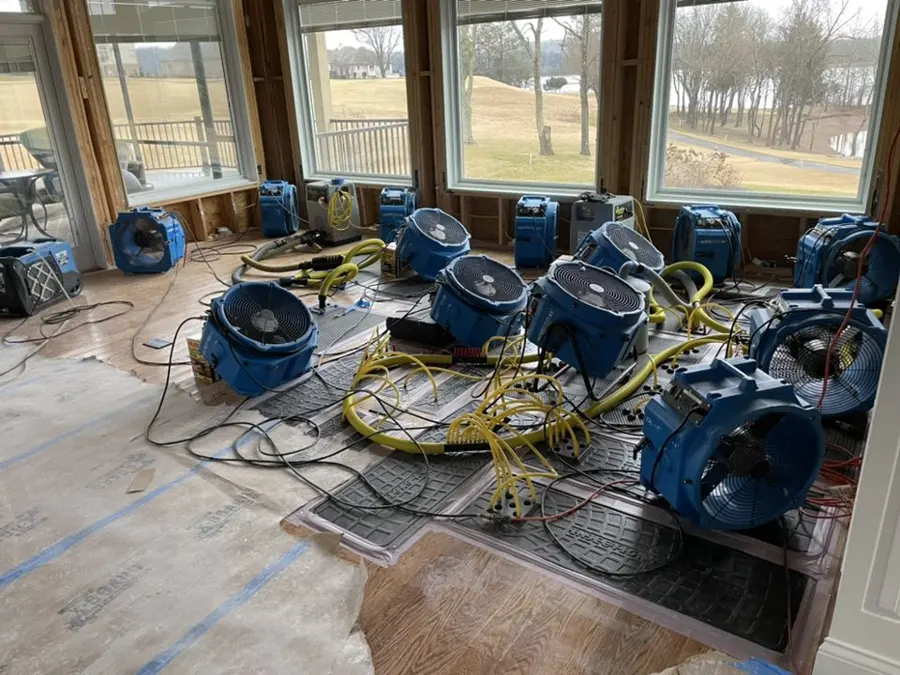 Multiple air movers drying a large room in Bedford, TX